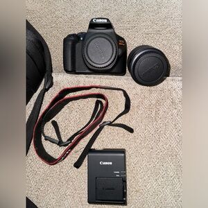 Canon EOS REBEL T7 camera with 18-55 mm lens DSLR